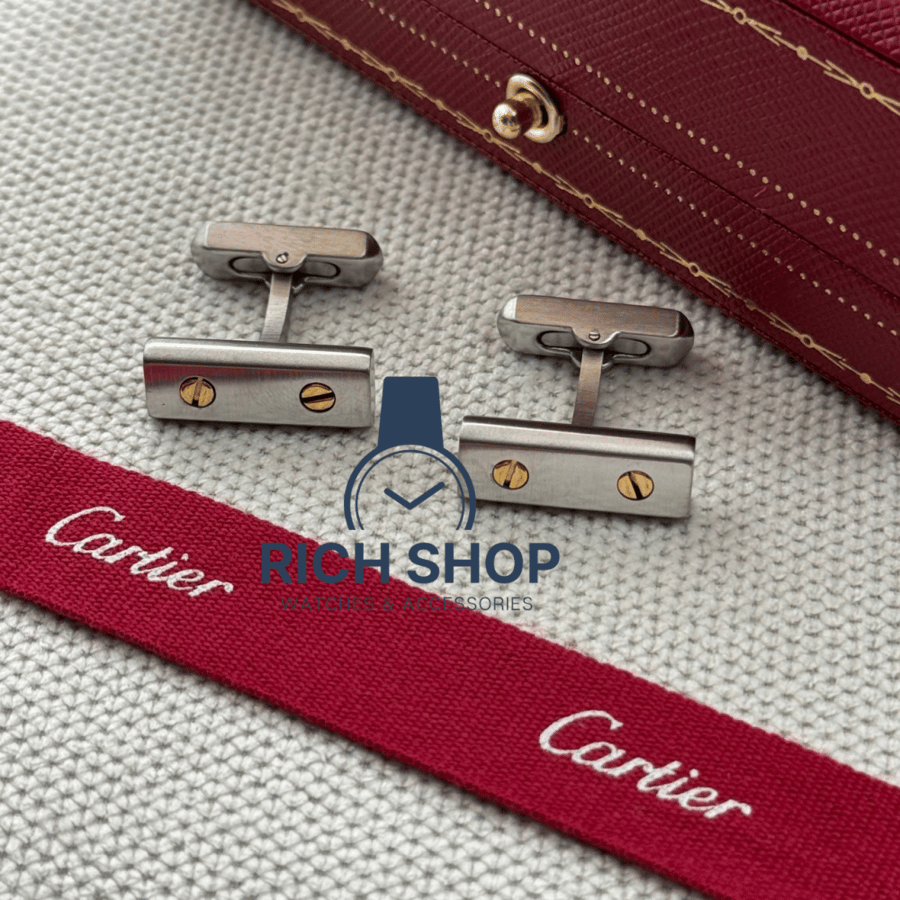 Silver Cartier cuff with gold screws