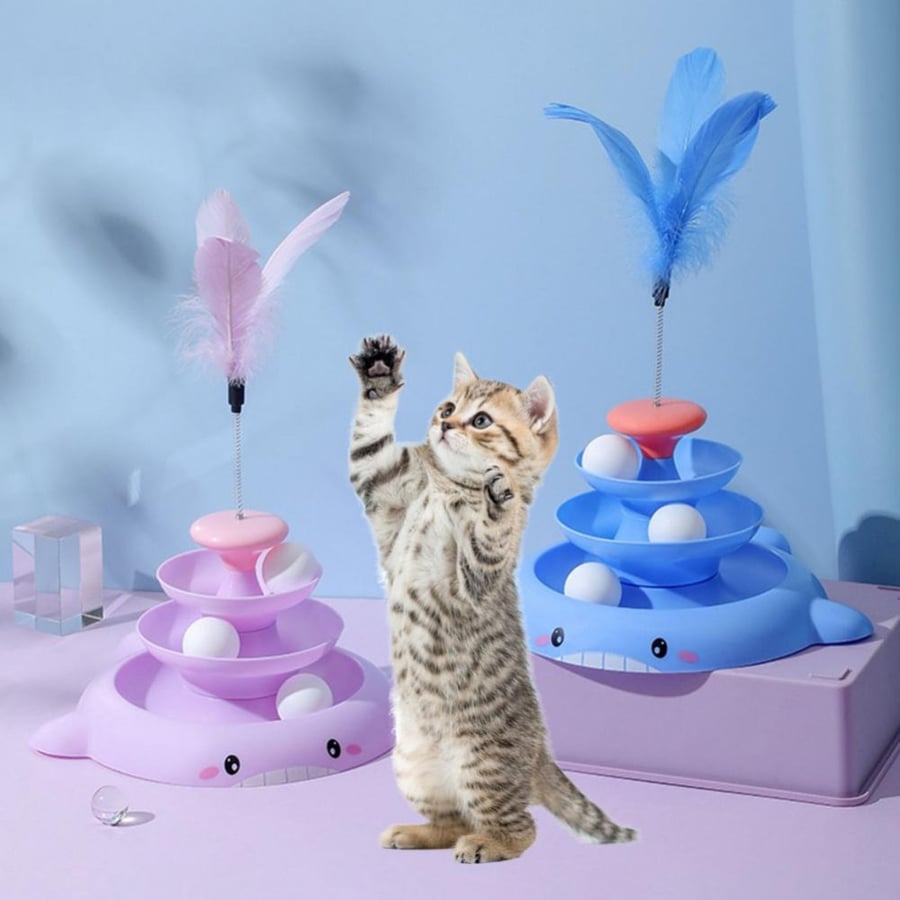 A whale-shaped cat toy with a built-in bell and feathers from Pet & More