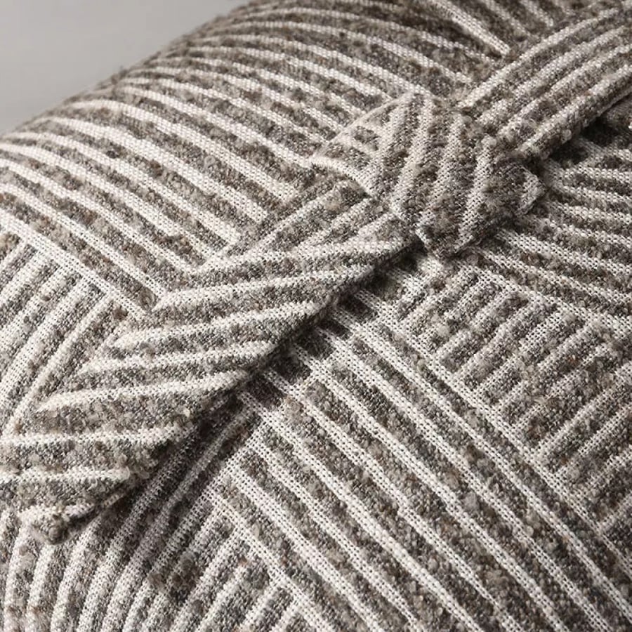 A distinctive pillow cover in brown and white