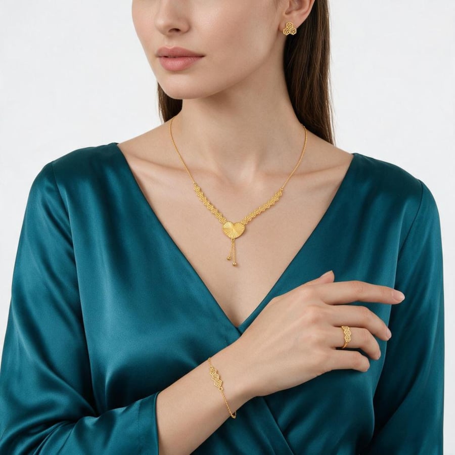 طقم ذهب سداسي قلب مموج لماع - عيار 21