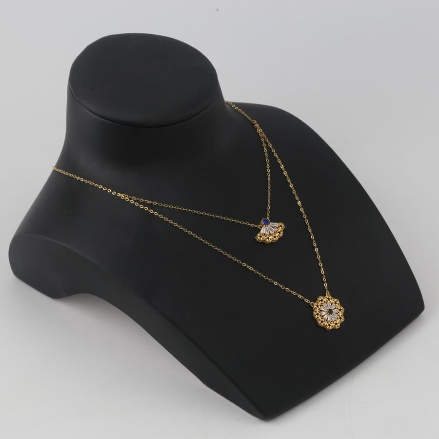 Half a gold set, two layers, distinguished, decorated with a crystal design - 21 karat