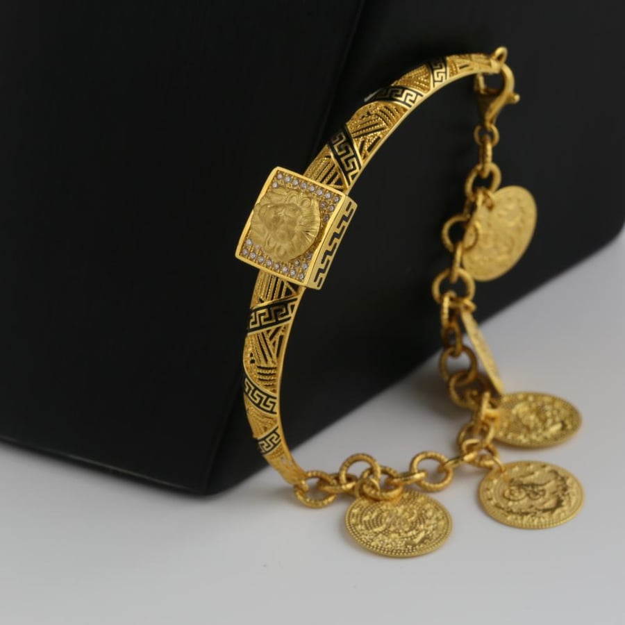 Gold bracelet standing with engraved circular comments - 21 karat