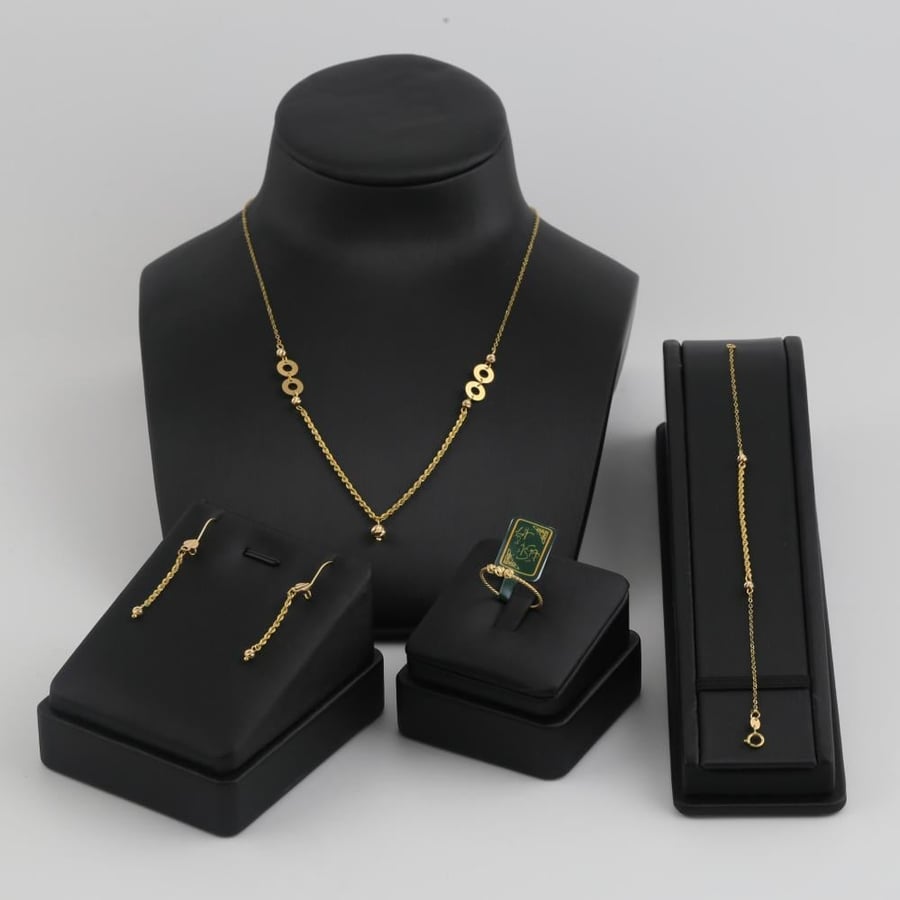 Gold set with laser-engraved ball parts - 21 karat
