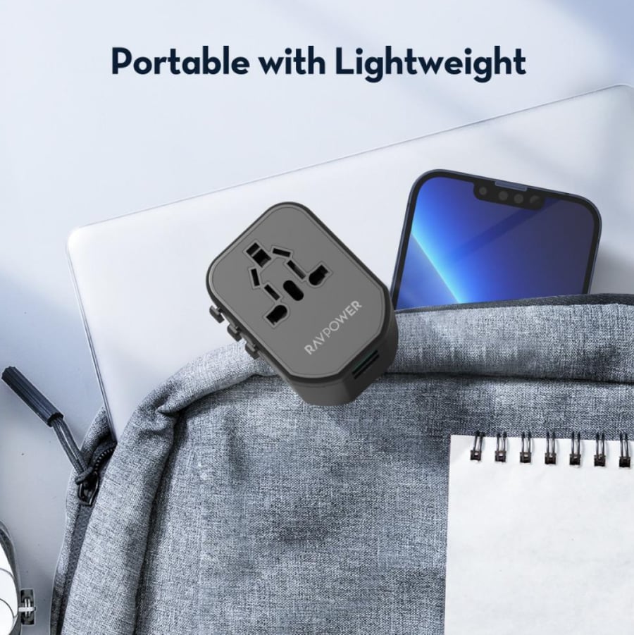 Travel charger RAV Power with 20-watt power, multiple inputs, two USB ports, and a Type-C port