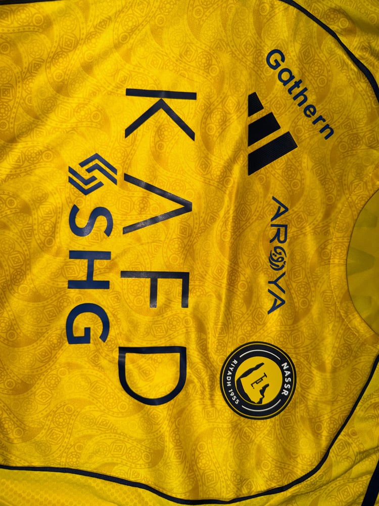 Al-Nasr website T-shirt