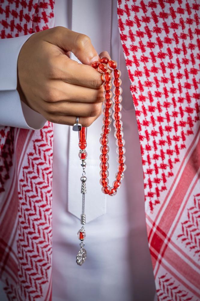 سبحة بكلايت شفاف خيط احمر