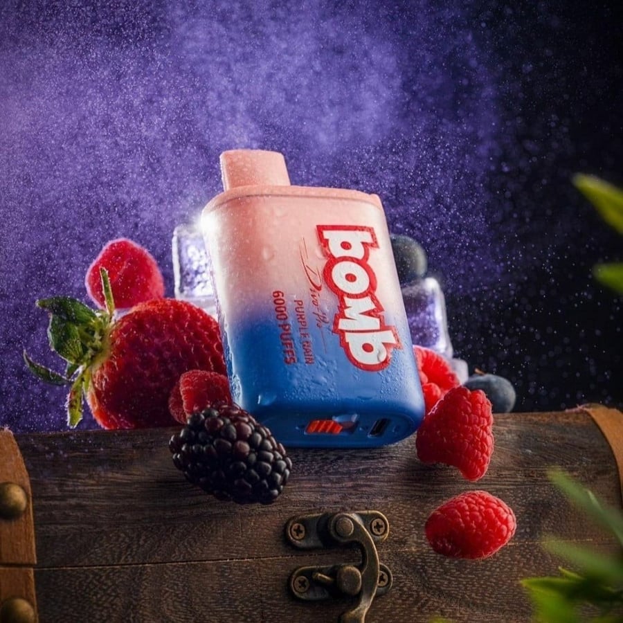 سحبة بومب 6000 توت فراولة BOMB 6000 PUFF PURPLE RAIN - فيب السعودية