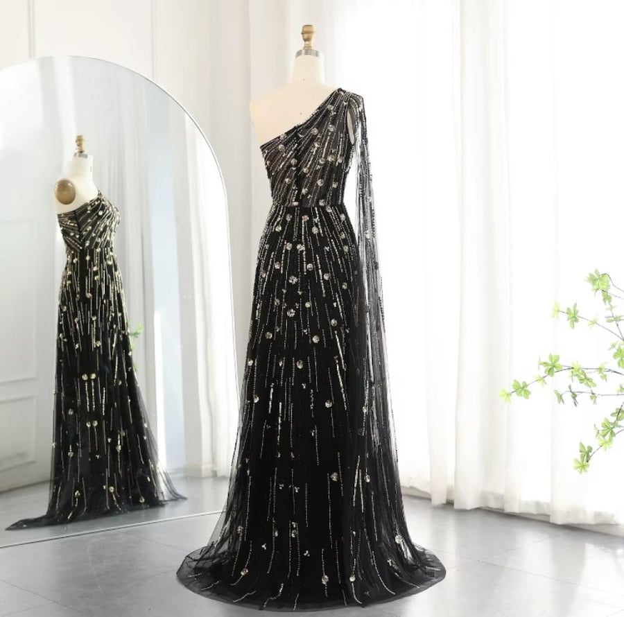 A full embroidery dress with an off-shoulder and kim sleeve