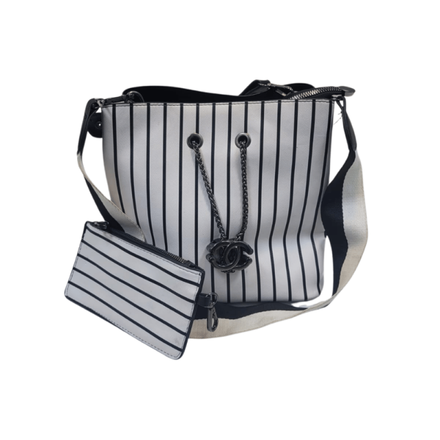 A women's handbag inspired by CHANEL with an additional wallet