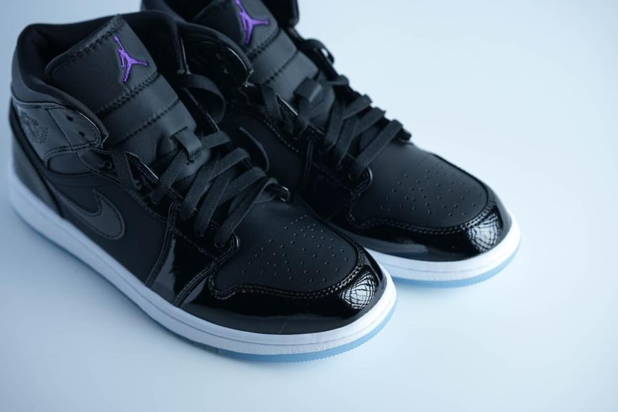 حذاء Jordan Mid أسود فاخر بلمعة جلد ولمسات بنفسجية ملفتة