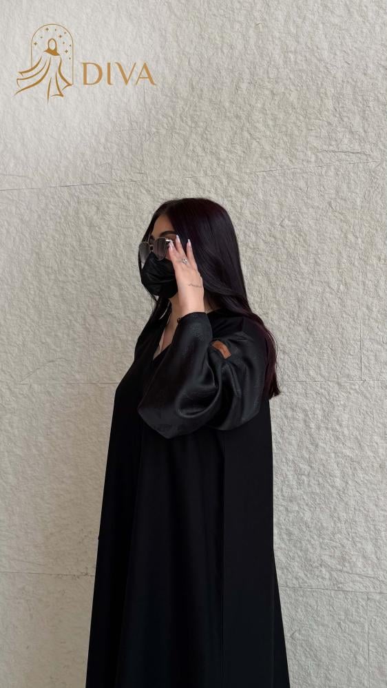 عباية فخمة مصنوعة من قماش كتان عالي الجودة يمنحك إحساسا بالراحة