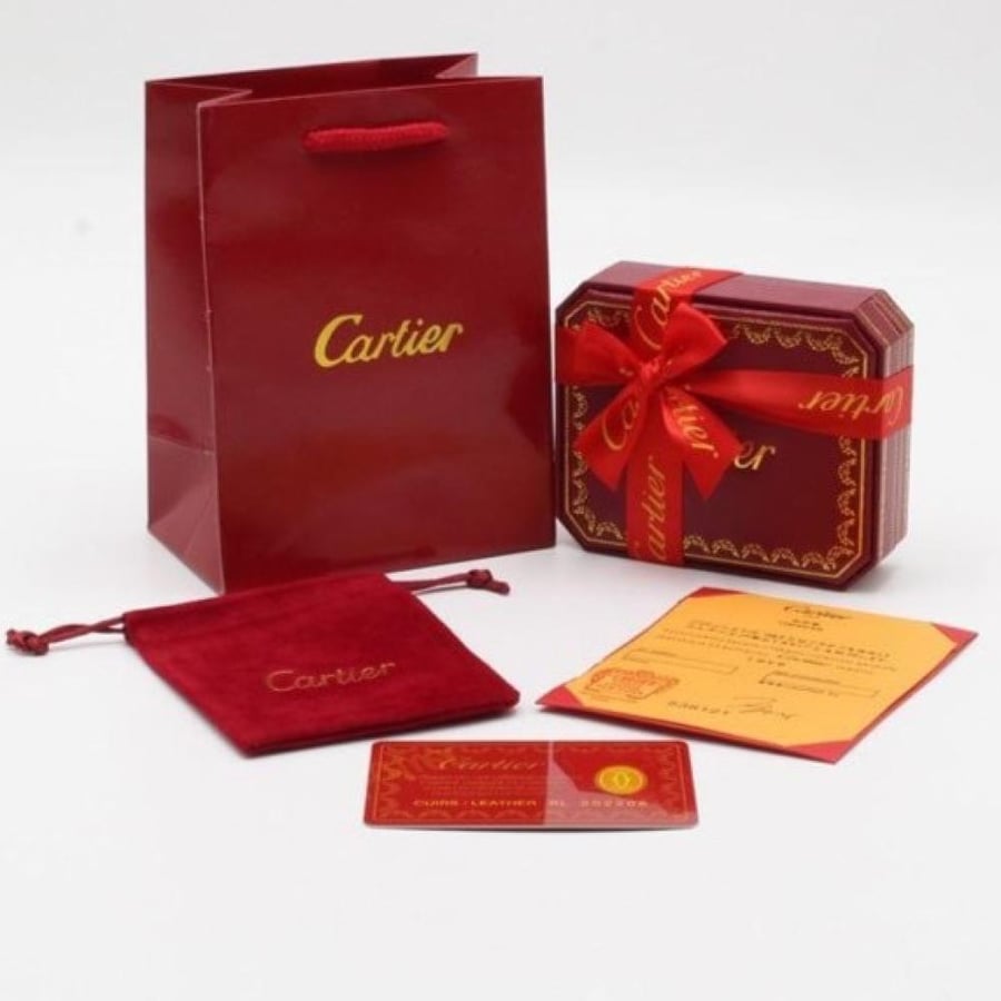 Cartier gold bracelet with all accessories