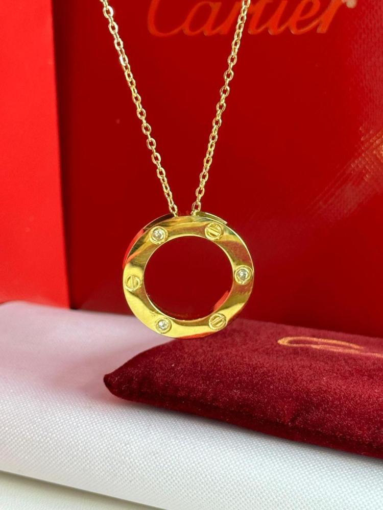 Cartier gold necklace including accessories