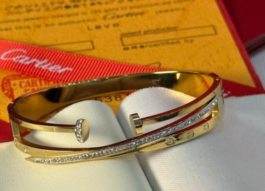 Cartier gold bracelet with all accessories