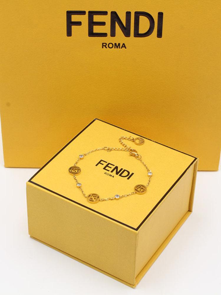 Fendi gold bracelet including accessories