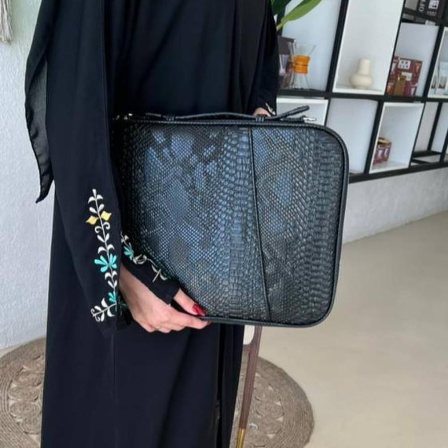 شنطة لابتوب جلد ثعبان اسود
