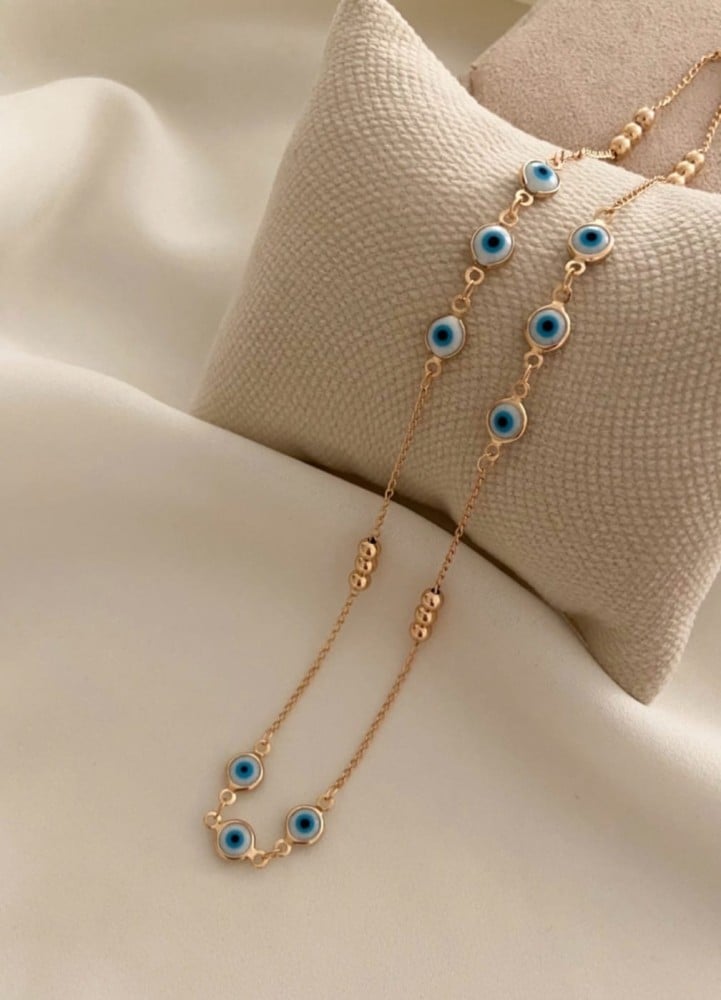 سلسال مع عيون زرقاء مطلي ذهب.                           MN-060