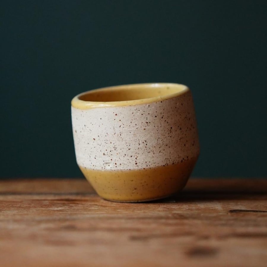 Yellow ceramic cup