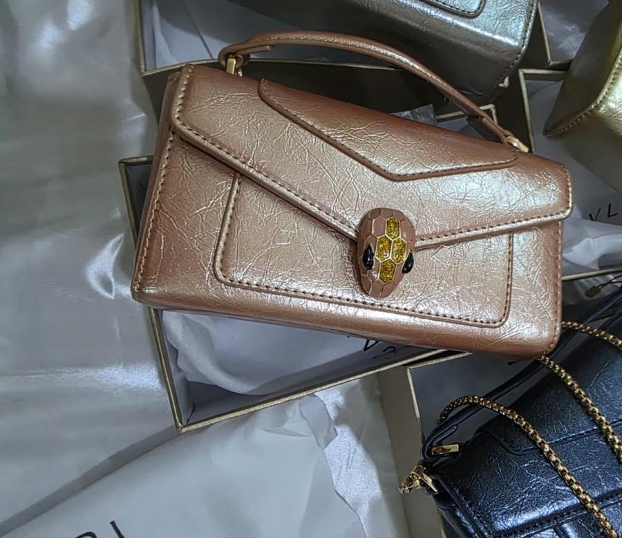شنطة كلاتش ديور الفاخرة