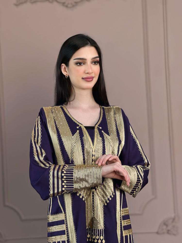 Muneer Al-Asiri dress