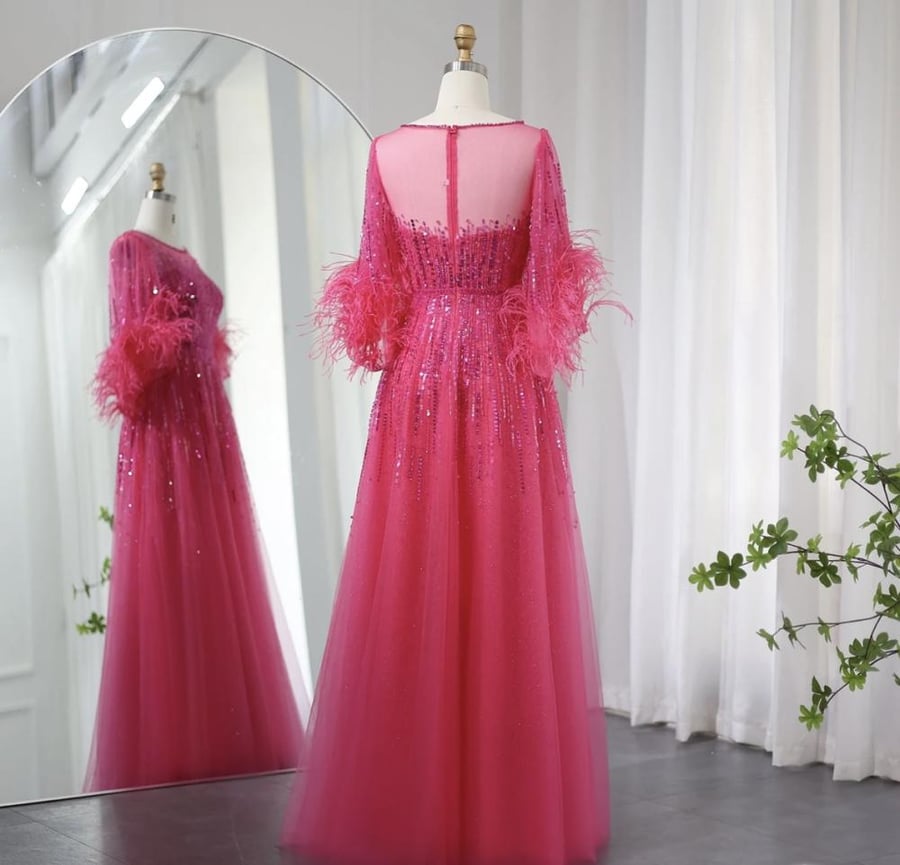 Luxury half sleeve feather evening dress from Samara Boutique