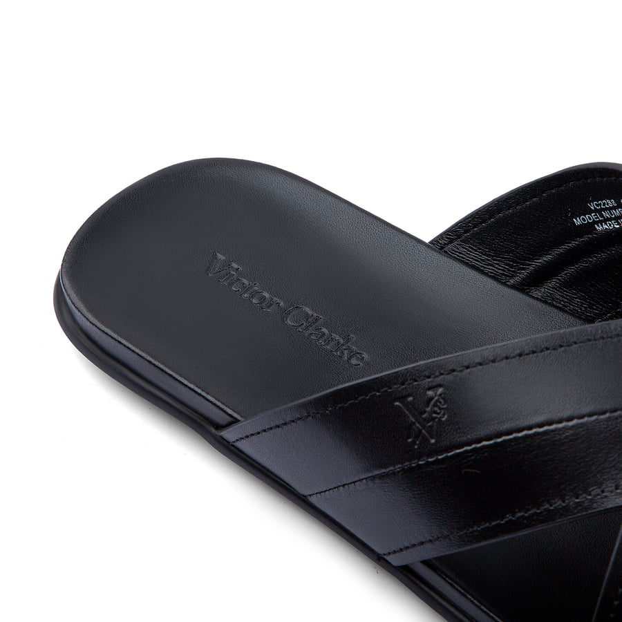 Men's black leather slippers from Victor Clark