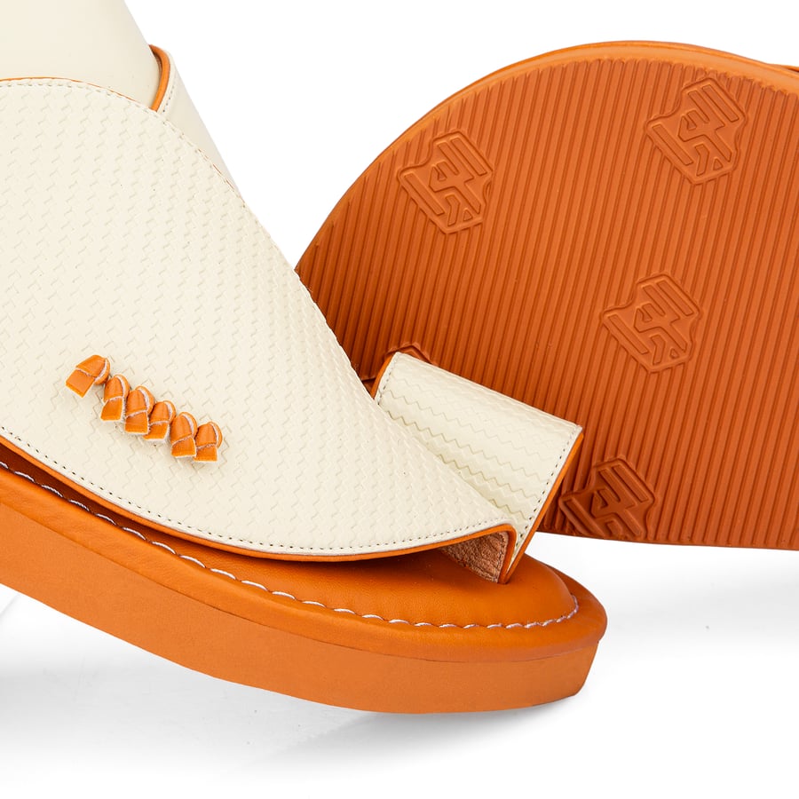 Eastern national slippers made of beige leather with a honey-colored medical sole