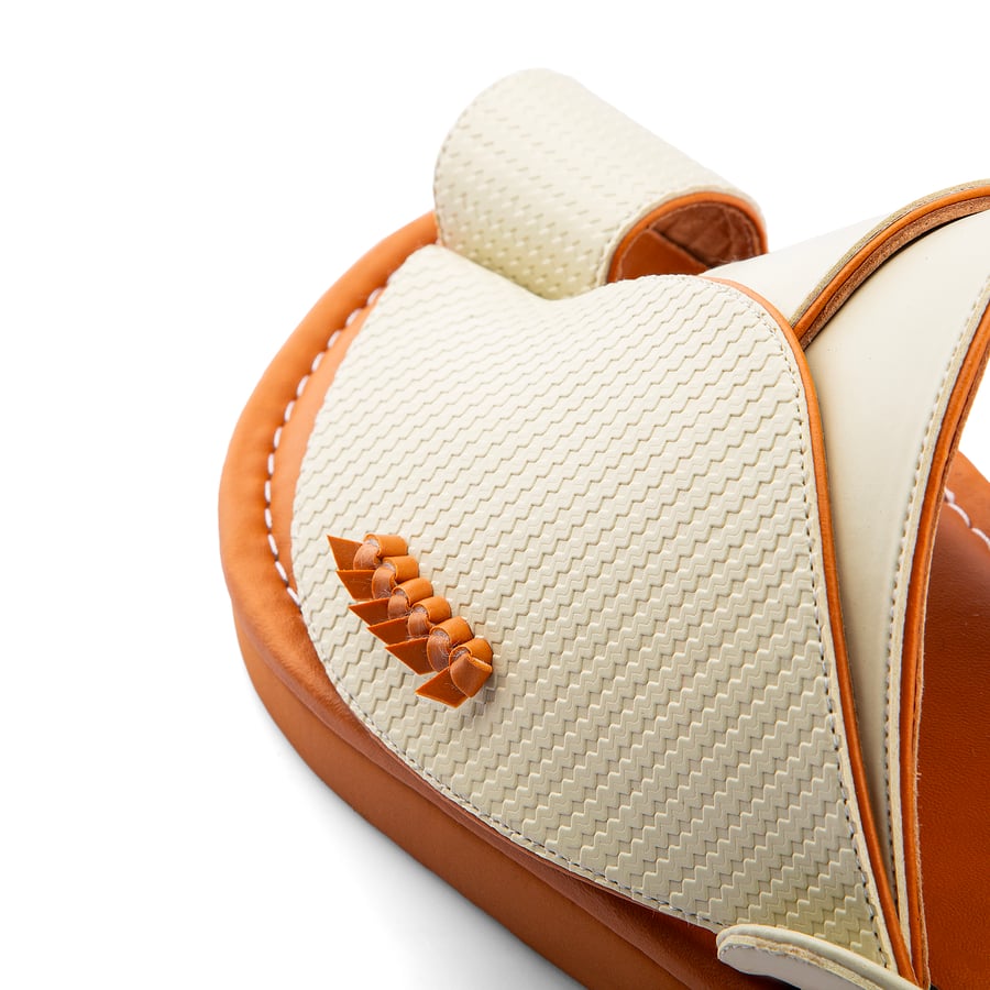 Eastern national slippers made of beige leather with a honey-colored medical sole