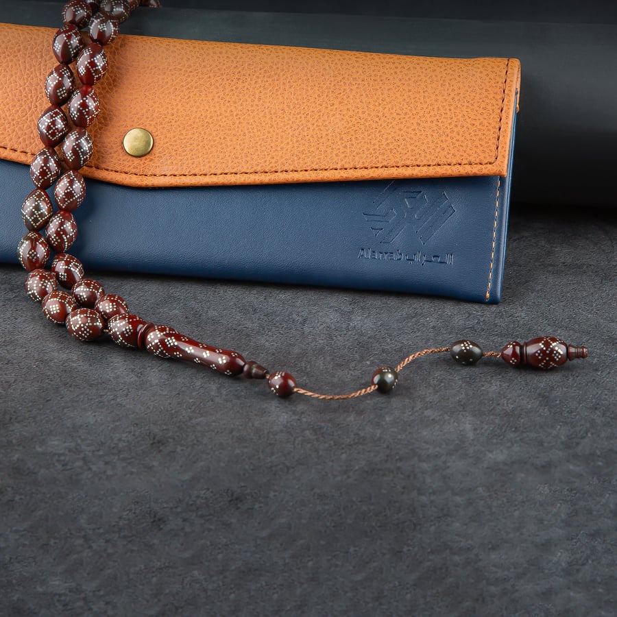 Luxury rosary made of brown beads embroidered with silver