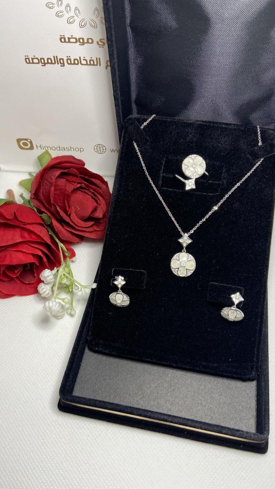 Elegant silver set decorated with ivory and mother of pearl