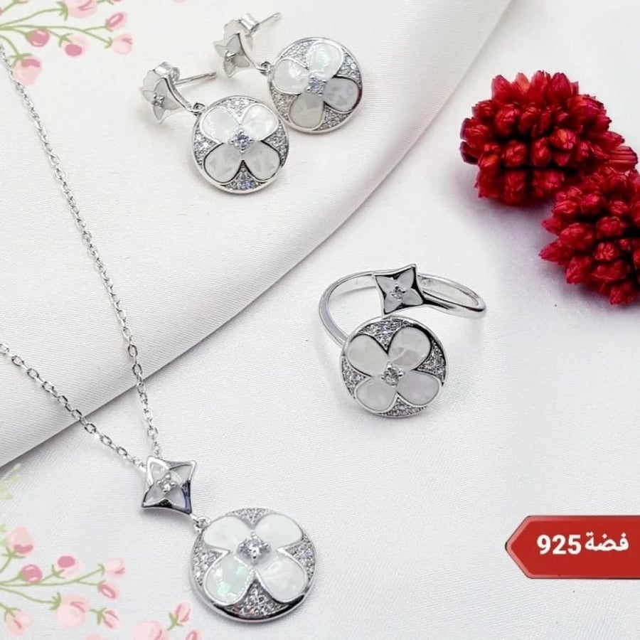 Elegant silver set decorated with ivory and mother of pearl