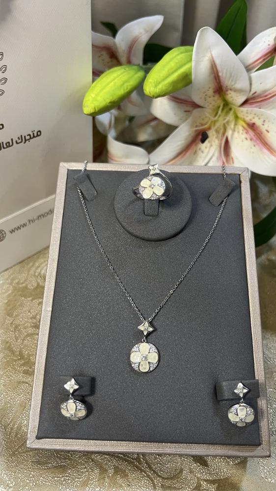 Elegant silver set decorated with ivory and mother of pearl