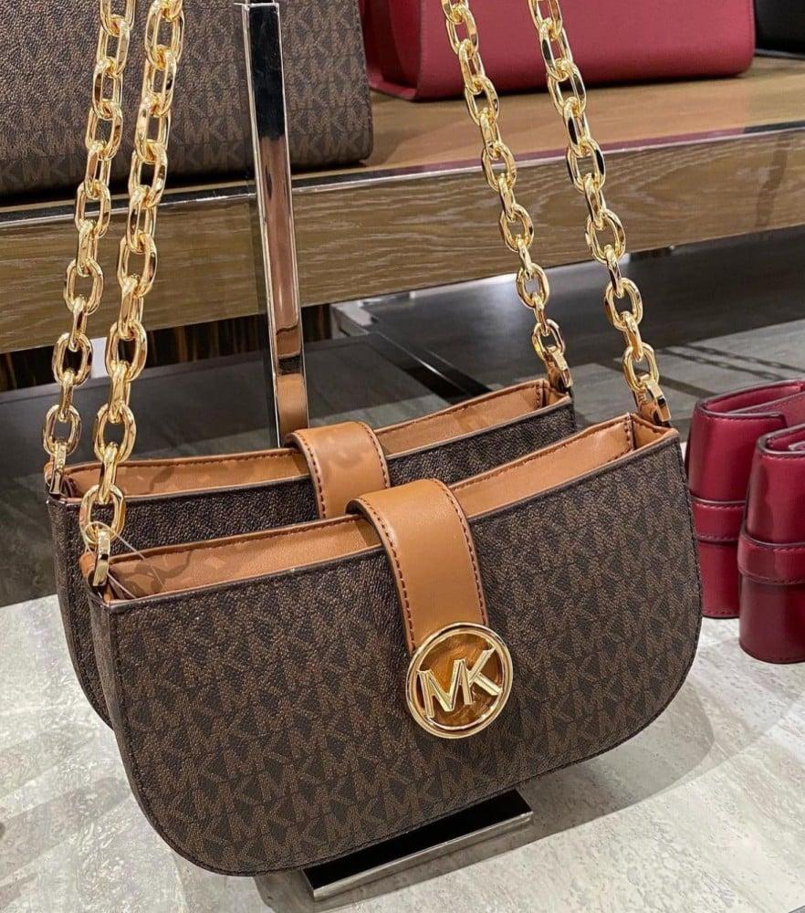 مايكل كورس - Michael Kors