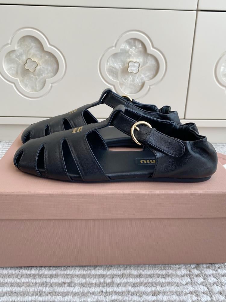 Stylish black Miu Miu sandal