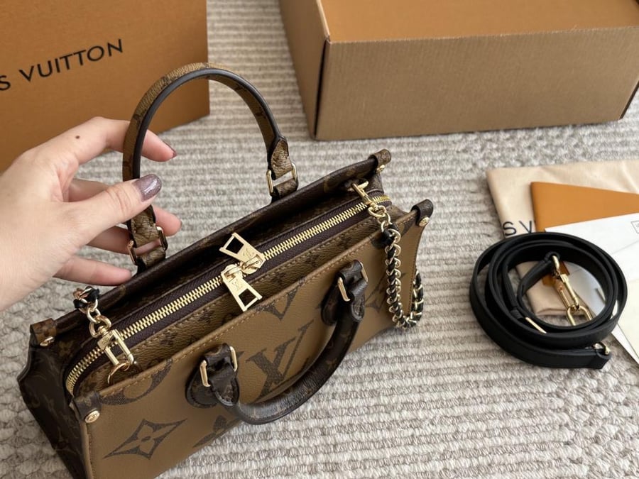 شنطة قوتشي بني