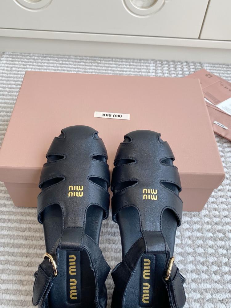 Stylish black Miu Miu sandal