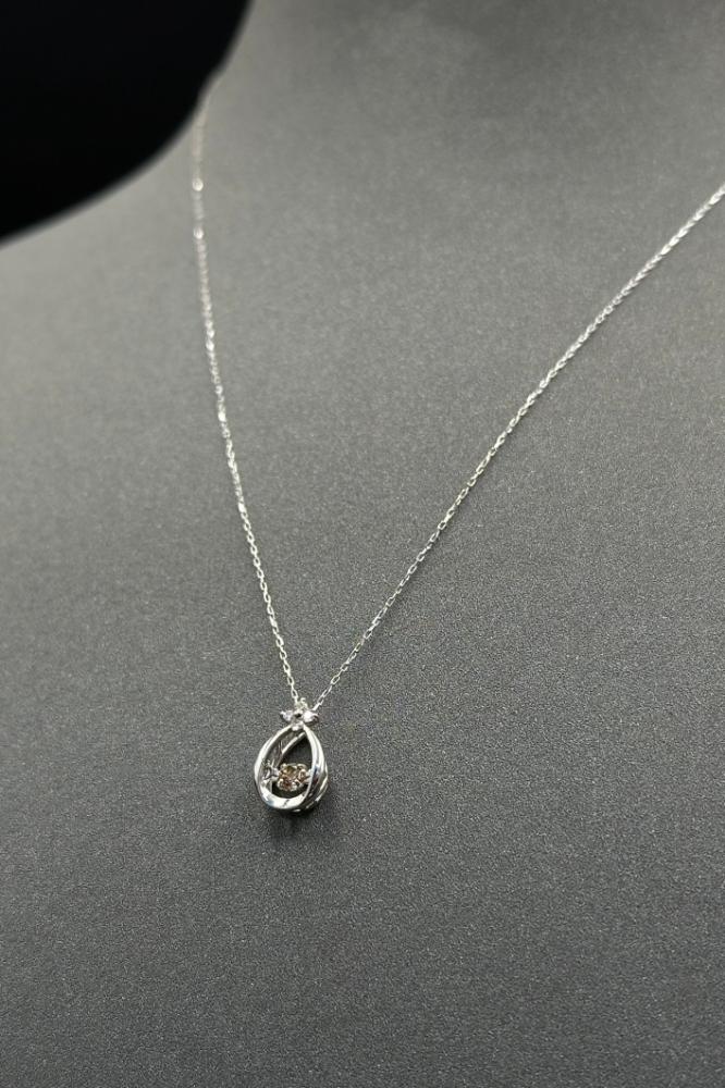 Diamond Necklace — Gold Weight: 1.1 Grams, Diamond Weight: 0.10 Carat