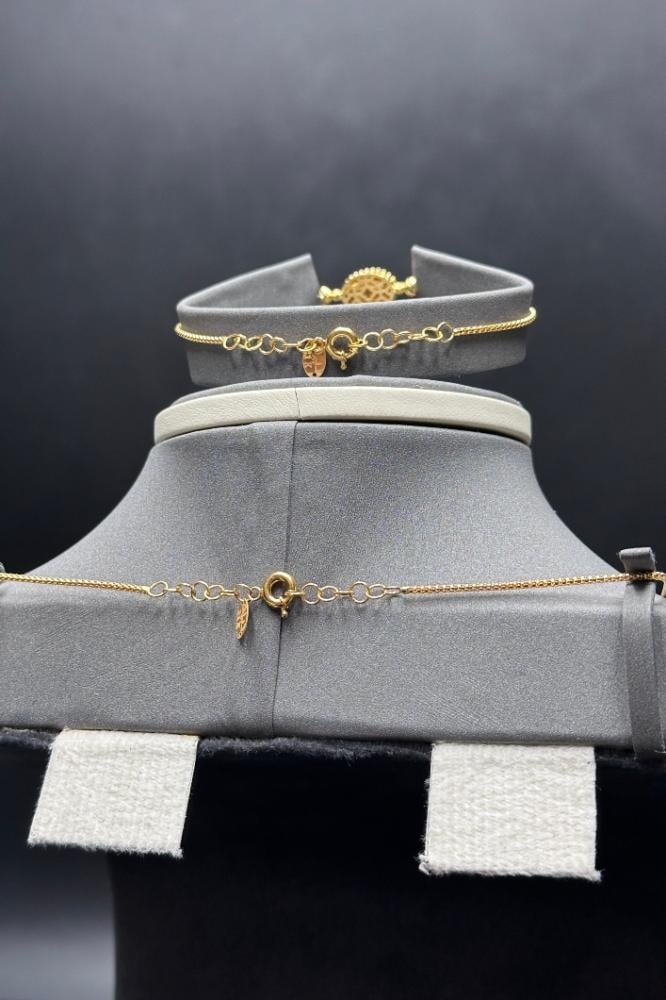 Premium 21K gold set with oval design, 20.8 grams