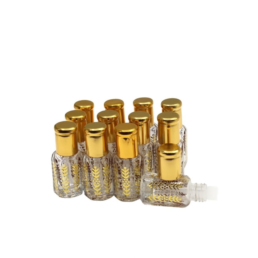 Perfume bottles, half a Tola