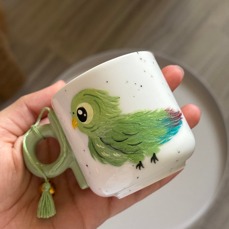 كوب ببغاء رسم يدوي
