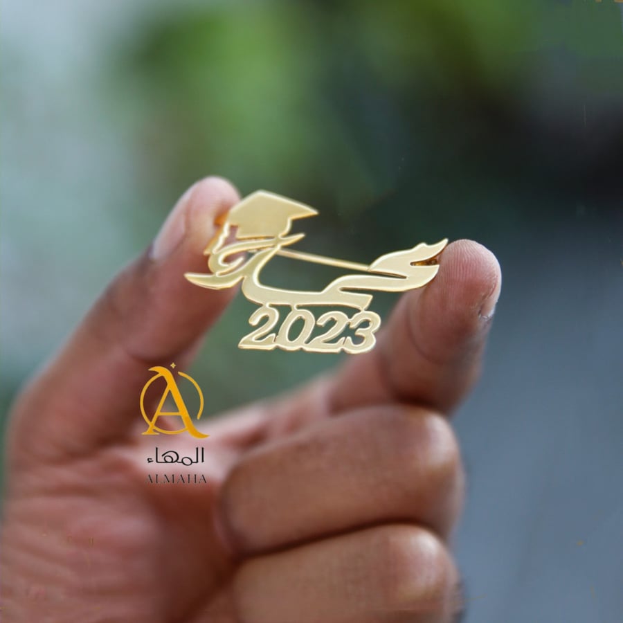 Graduation brooch with the name