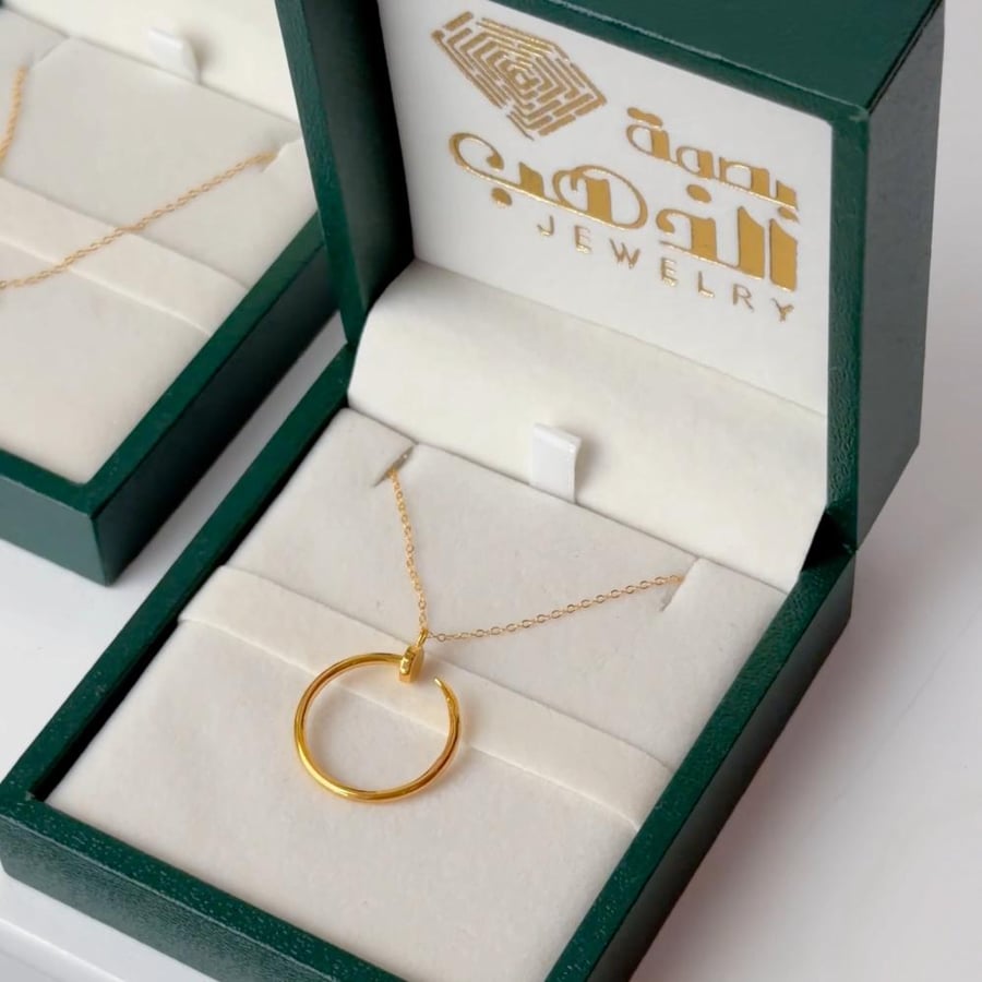 21 karat global design necklace