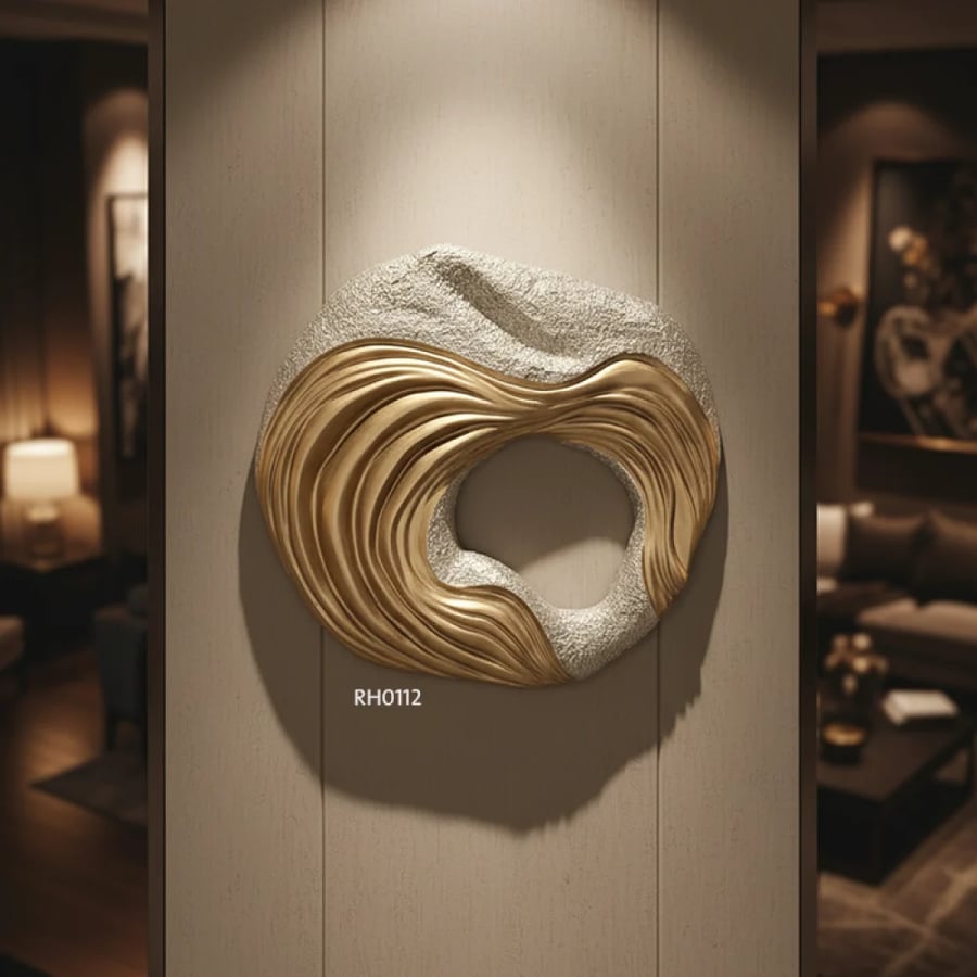 A three-dimensional abstract gold wall piece – a touch of modern luxury that adds depth and elegance to your wall with a modern design.