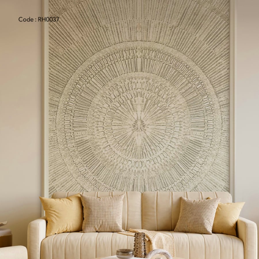 A wooden mural in a sculptural style with a central circular design.