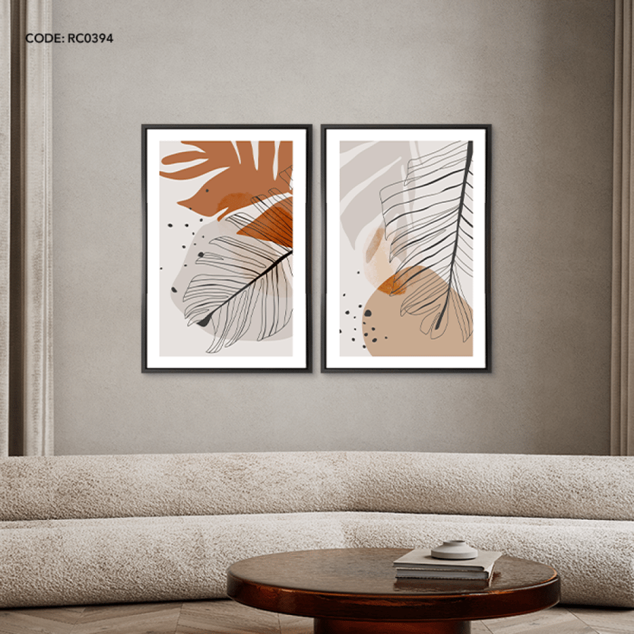 A canvas wall painting depicting leaves in shades of brown, gray, and beige.