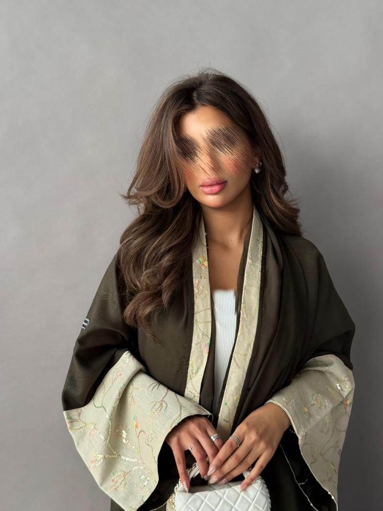 Abaya made of linen fabric, olive color, cuff edges in beige embroidered, flared style
