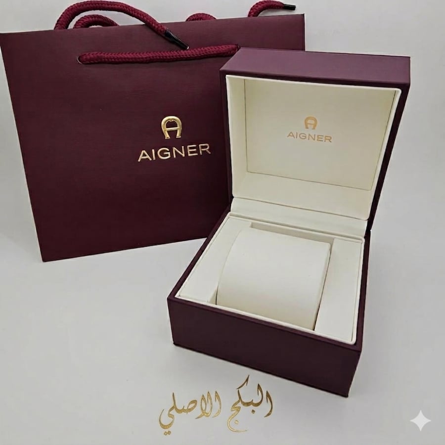 ساعة اقنر فضي وذهبي بإطار أخضر ماستر كوبي
