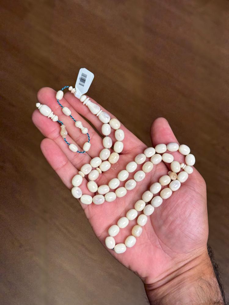 مسباح عظم جمل بيض حمام