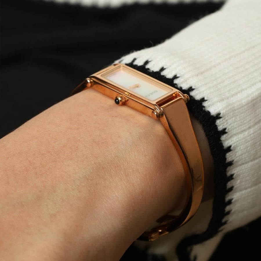 Gucci swiss gold