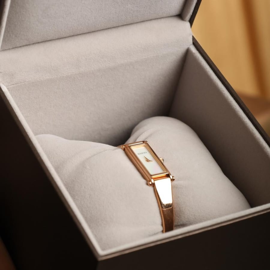 Gucci swiss gold